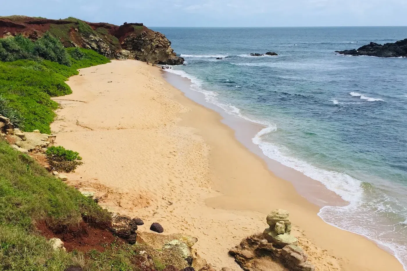 Red-earth coastal landscape at Ussangoda